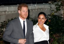 ფეხმძიმე მეგან მარკლი ღრმადშეხსნილ კაბაში